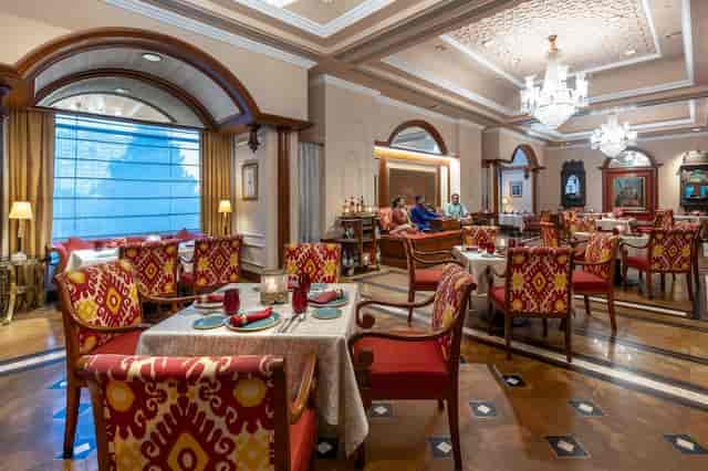 Elegant dining space at Eros Hotel, ideal for upscale events and intimate meetings.