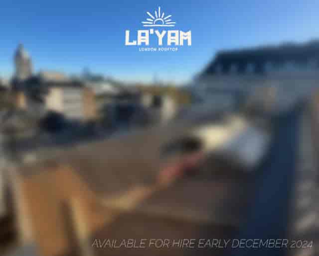 La'Yam Rooftop venue with urban backdrop, ideal for stylish events and gatherings.