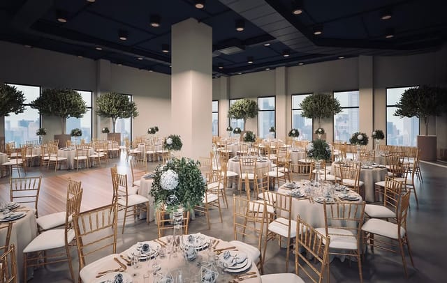 Elegant ballroom with round tables, perfect for events and gatherings.