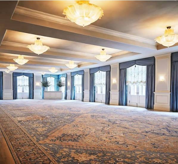 Elegant Mansion Ballroom with chandeliers for corporate events and receptions.