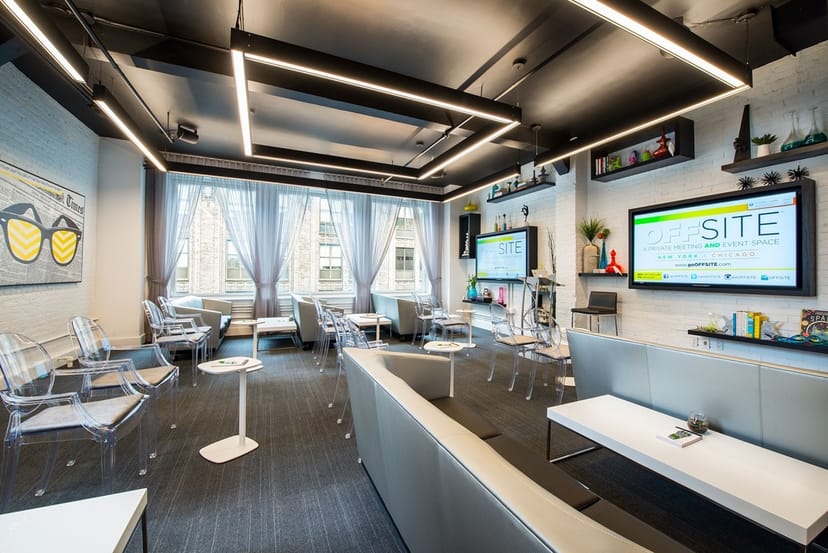 Modern conference center with large windows, ideal for workshops and meetings.