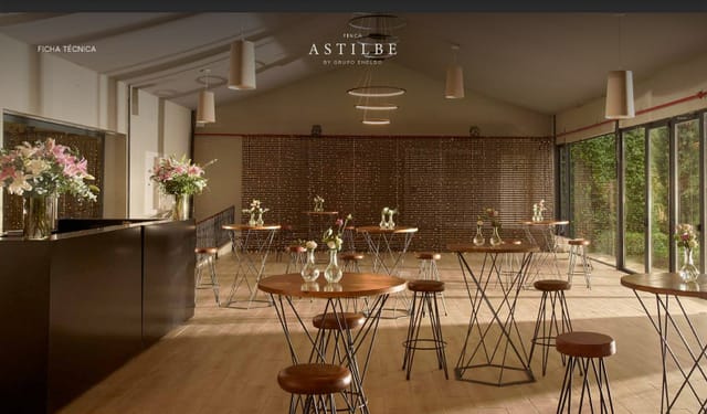 Stylish event space at Finca Astilbe with modern decor, ideal for corporate and social gatherings.