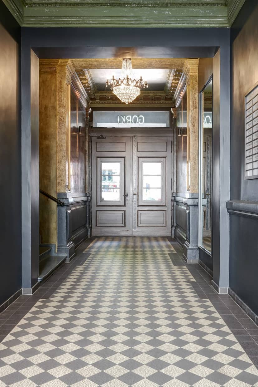 Elegant entrance of Gorki Apartments with double doors for upscale events.