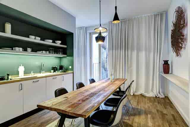 Modern meeting space in Gorki Apartments, ideal for team brainstorming sessions.