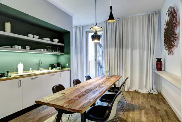 Modern meeting space in Gorki Apartments, ideal for team brainstorming sessions.
