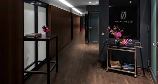 Modern AMANO Conference Room reception with stylish decor for corporate gatherings.