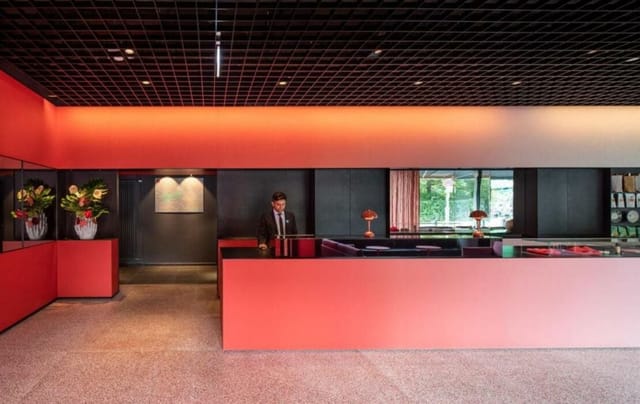 Modern reception at Roof Lounge, Casa Camper Berlin, with vibrant colors for events.
