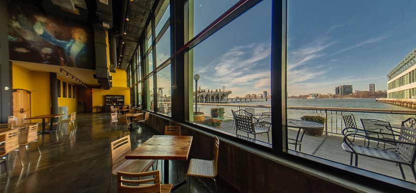 Mezzanine Level at City Winery Pier 57, stylish venue with waterfront view for events.