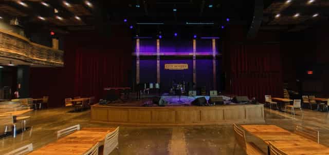 Mezzanine Level at City Winery: spacious event space with vibrant lighting for concerts.