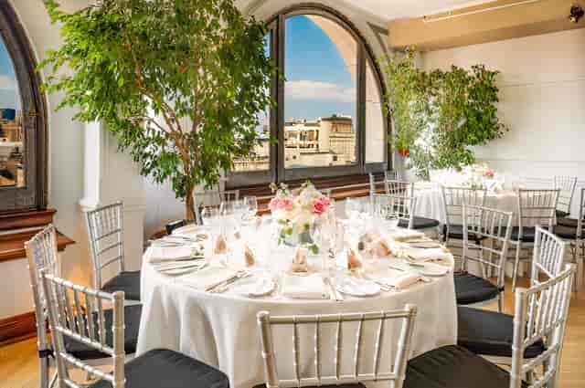 Elegant dining setup in The Penthouse, Manhattan; perfect for upscale events and gatherings.