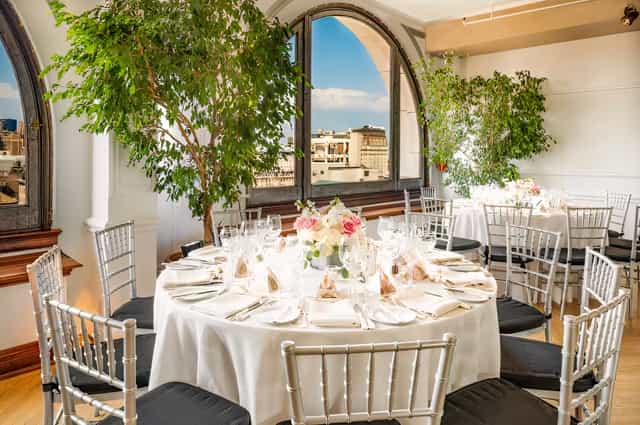 Elegant dining setup in The Penthouse, Manhattan; perfect for upscale events and gatherings.