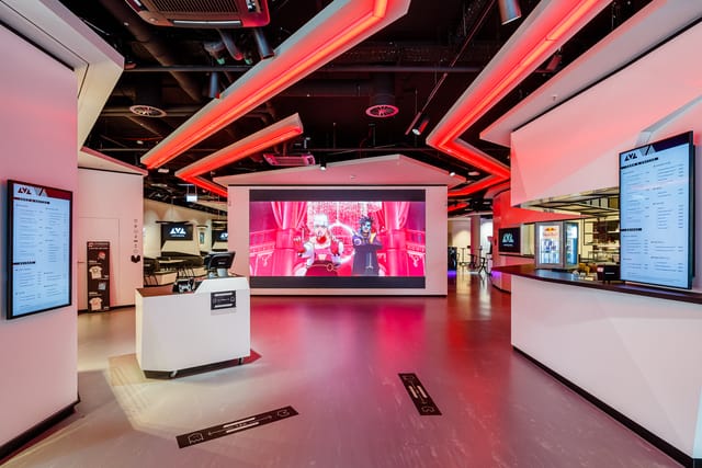 Red Bull Lounge in Berlin: modern event space with vibrant lighting for meetings and launches.