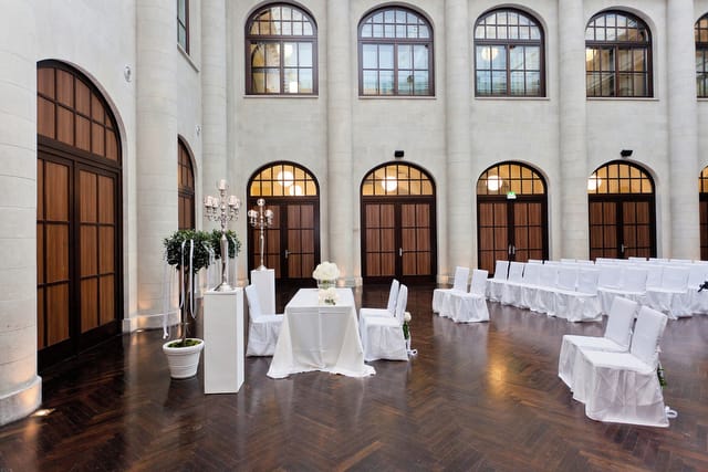 Elegant event space with arched windows, perfect for intimate ceremonies and receptions.