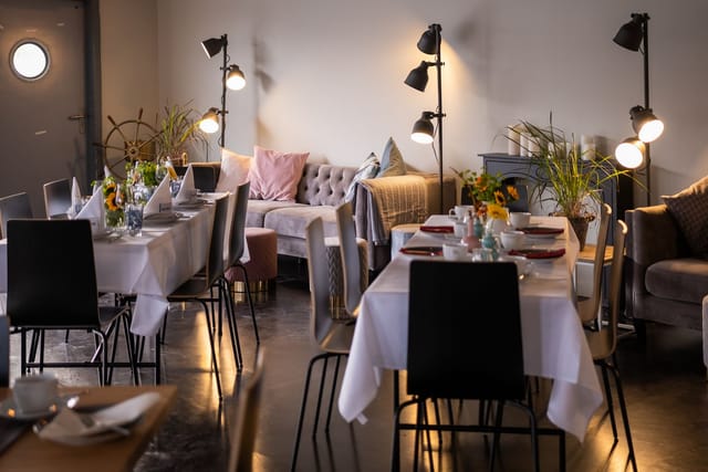 Stylish conference room in Dock 10, perfect for dining events and networking gatherings.