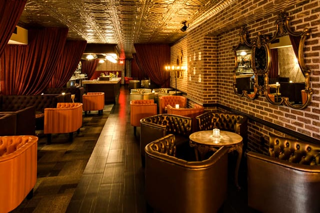 Stylish venue with plush seating for intimate gatherings and networking events.