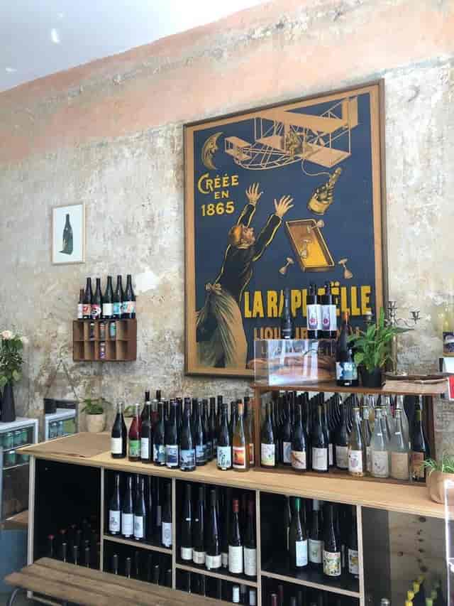 Vintage bar and wine cellar with rustic walls, perfect for networking events.