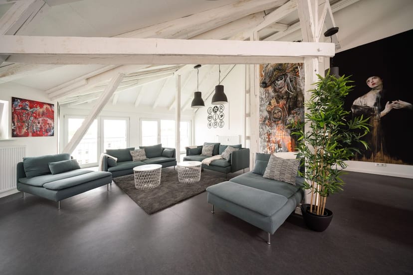 Stylish Attic Studio lounge at URBAN NATION for networking and meetings.