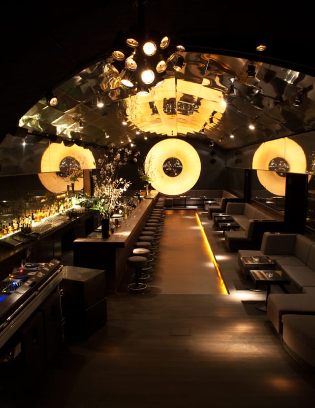 Sleek modern bar at Bar Tausend, ideal for upscale events and mixers.