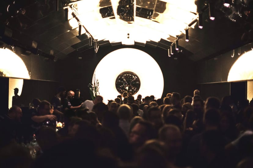 "Bar Tausend event space with circular design, ideal for networking and cocktail receptions."