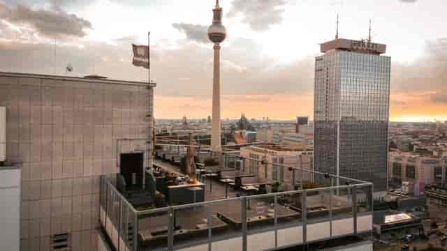 Stunning city skyline with iconic tower for rooftop events and receptions.