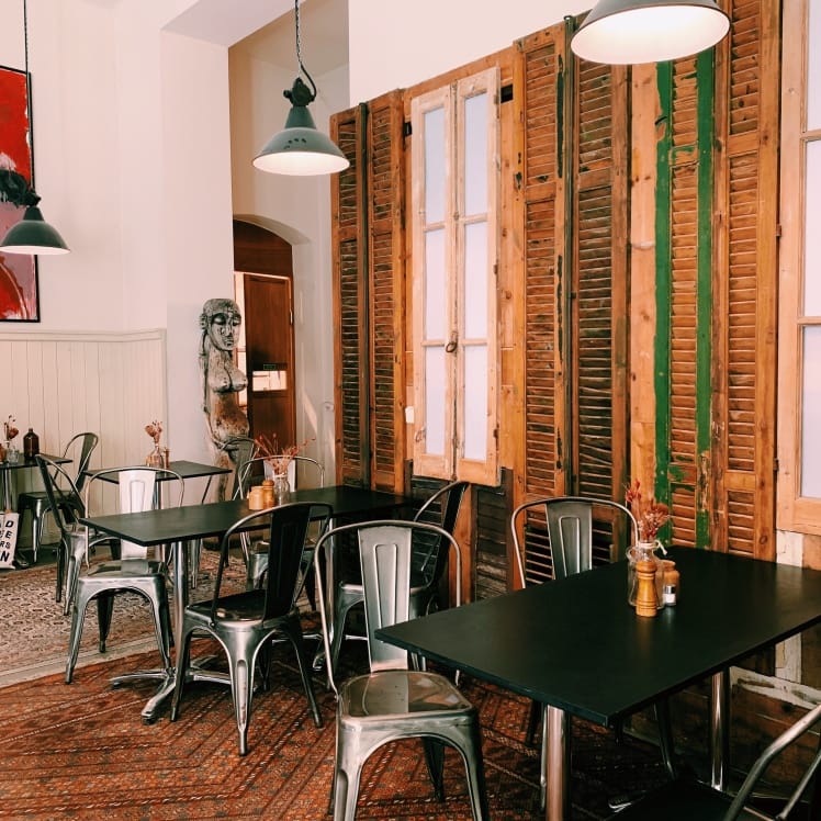 Cozy Cafe Space at Father Carpenter, ideal for intimate meetings and networking events.