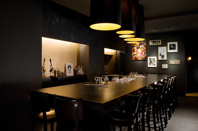 Intimate Buck and Breck bar with warm lighting for networking events and private gatherings.