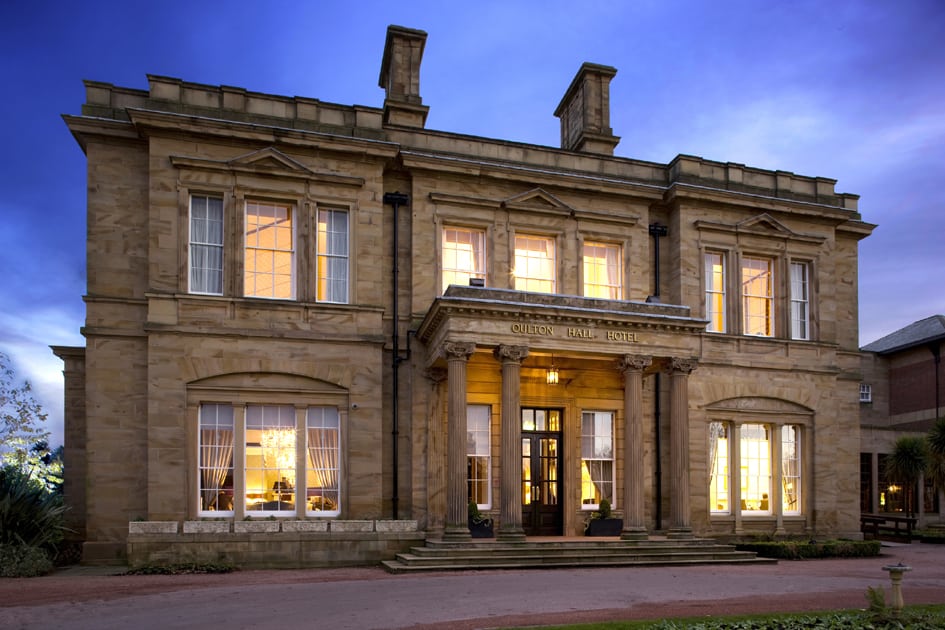 Elegant Oulton Suite at Oulton Hall, ideal for meetings and events with grand architecture. - Banner