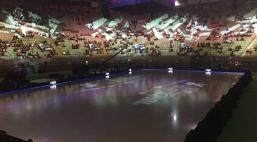 Ice rink event at Palacio Vistalegre with vibrant branding for figure skating shows.