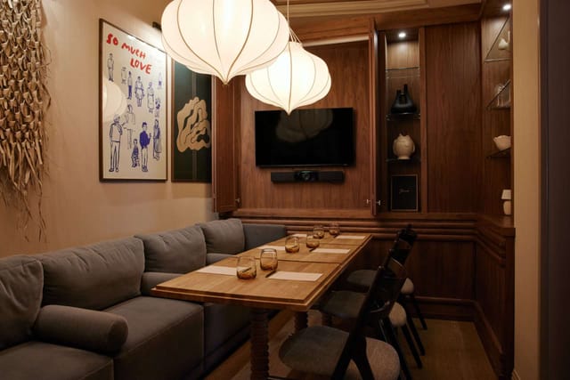 Cozy meeting room with plush seating, perfect for intimate gatherings and team retreats.