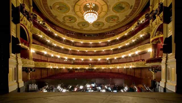 Grand theater interior at Det Kongelige Teater, ideal for performances and events.