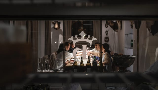 Private dining setup in Kong Hans Kælder for exclusive corporate dinners or events.