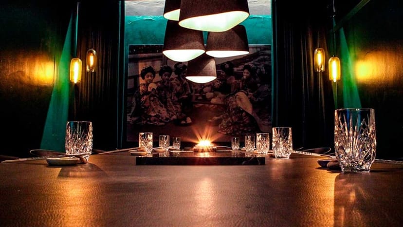 Intimate Sake Rummet dining space with elegant table for exclusive events and meetings.