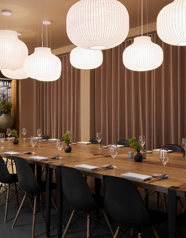 Elegant dining setup at Sushi Suiten for corporate meetings and upscale events.