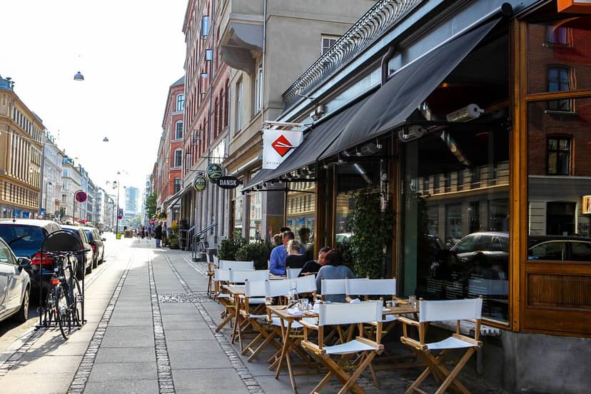 Charming outdoor café at Sticks'n'Sushi, ideal for casual meetings and networking.