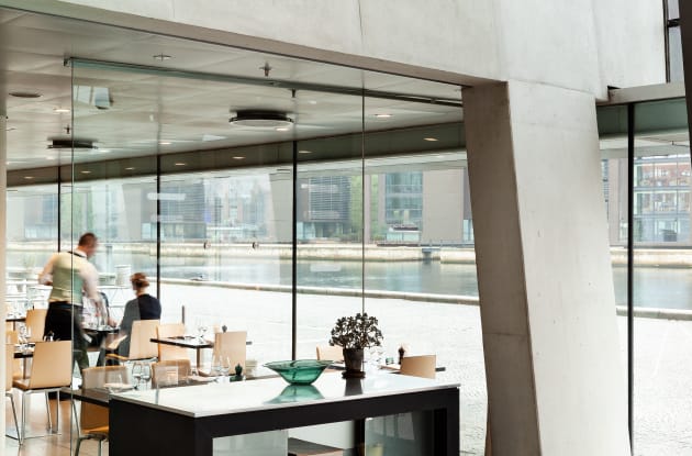 Modern meeting venue in The Black Diamond with waterfront views for events.