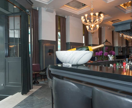 Elegant champagne bar setup at D'Angleterre for upscale events and celebrations.
