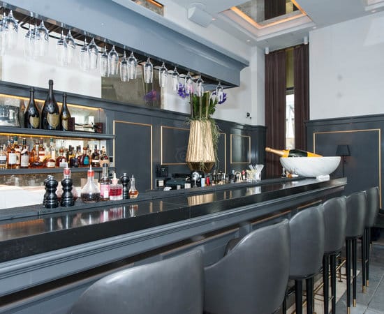 Elegant bar at D'Angleterre, ideal for networking events and cocktail receptions.