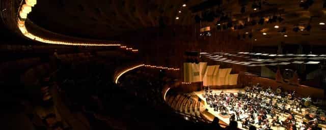 Royal Danish Academy of Music hall, featuring elegant seating for concerts and events.