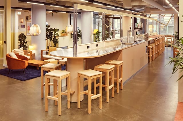 Modern gallery bar in CityHub Copenhagen, ideal for networking events and meetings.