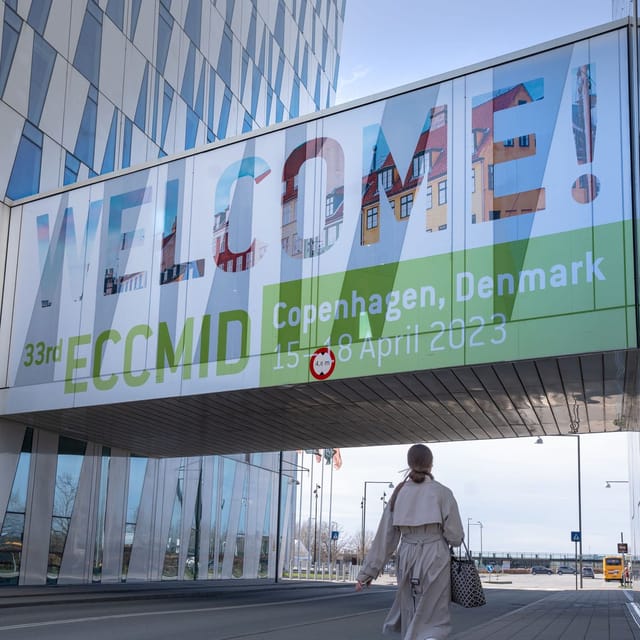 "Welcome banner for 33rd ECCMID conference in Copenhagen, highlighting accessibility and engagement."