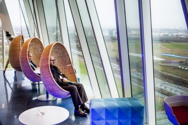 Copenhagen CVB lounge with swinging chairs for networking events and relaxation.