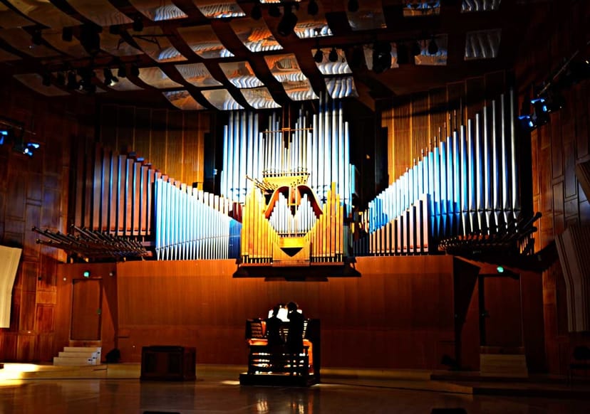 Main Hall at Royal Danish Academy with stunning pipe organ, ideal for concerts and events.