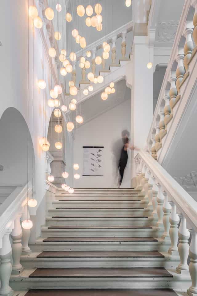 Chic stairway at Amtsalon Wilmina, elegant design for upscale events and conferences.