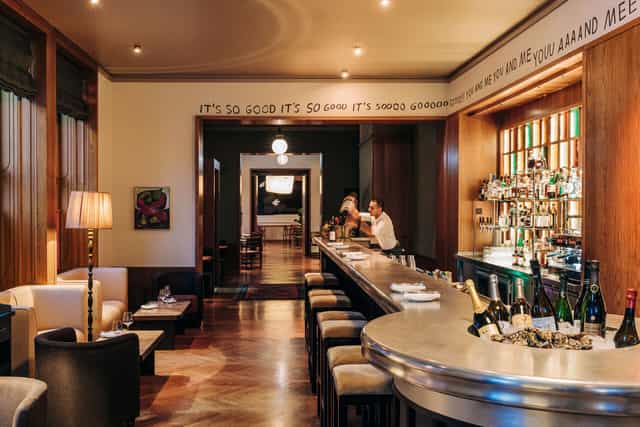 Sleek hotel bar at Château Royal, ideal for networking and pre-event gatherings.