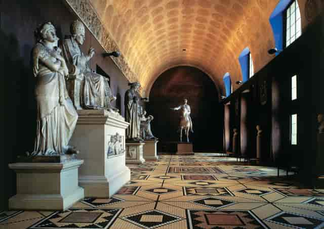 Main Hall of Thorvaldsens Museum with classical sculptures, ideal for upscale events.