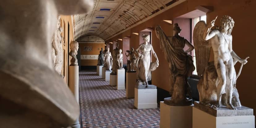 Main Hall in Thorvaldsens Museum, featuring classical sculptures for elegant events.