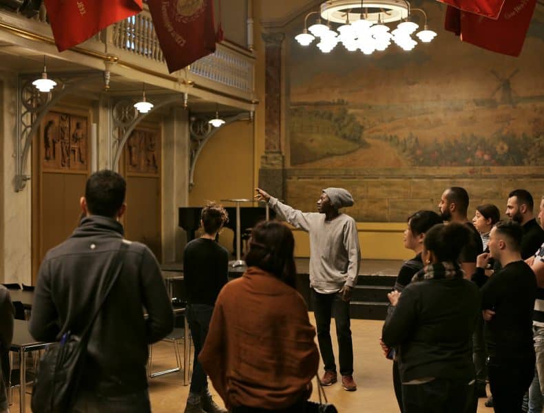 Event planners tour Mødelokalet Pio, a charming venue for gatherings and events.