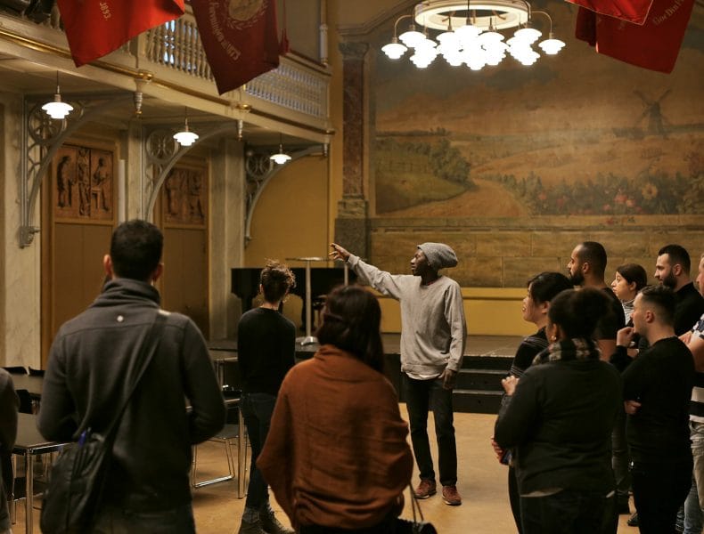 Event planners tour Mødelokalet Pio, a charming venue for gatherings and events.