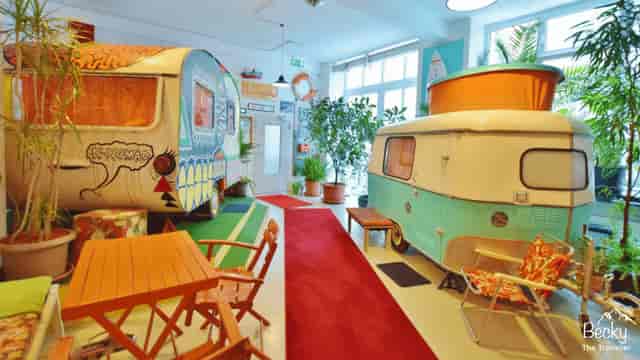 Colorful retro caravans in Hüttenpalast ideal for team-building events and meetups.