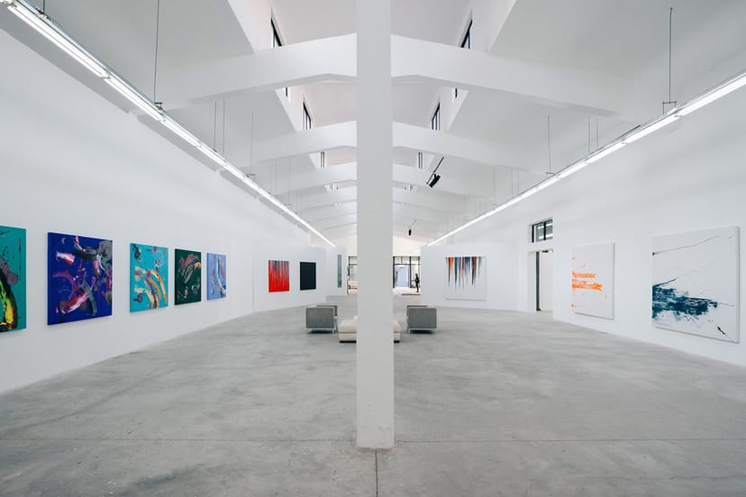 Spacious Shanghai Museum gallery with vibrant artwork, ideal for events and workshops.